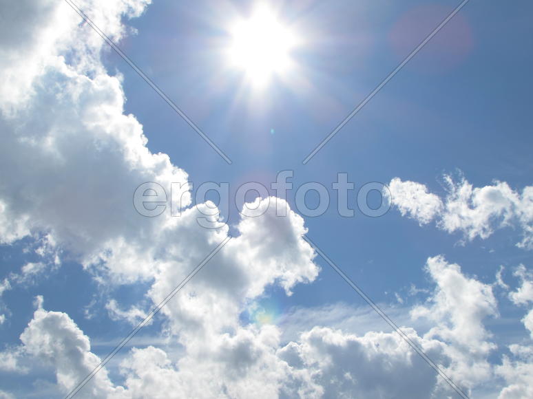 Солнце в облачном небе