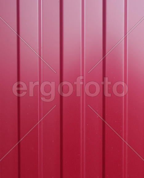Diagonal pattern of metal profile. Fences from the galvanized iron painted by a polymeric covering