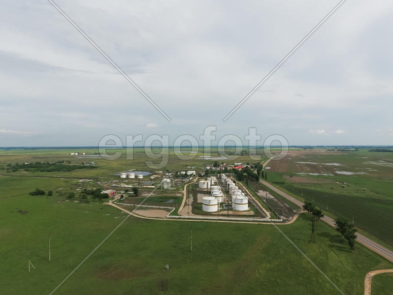 Aerial view of oil storage tanks. Industrial facility for the storage and separation of oil.