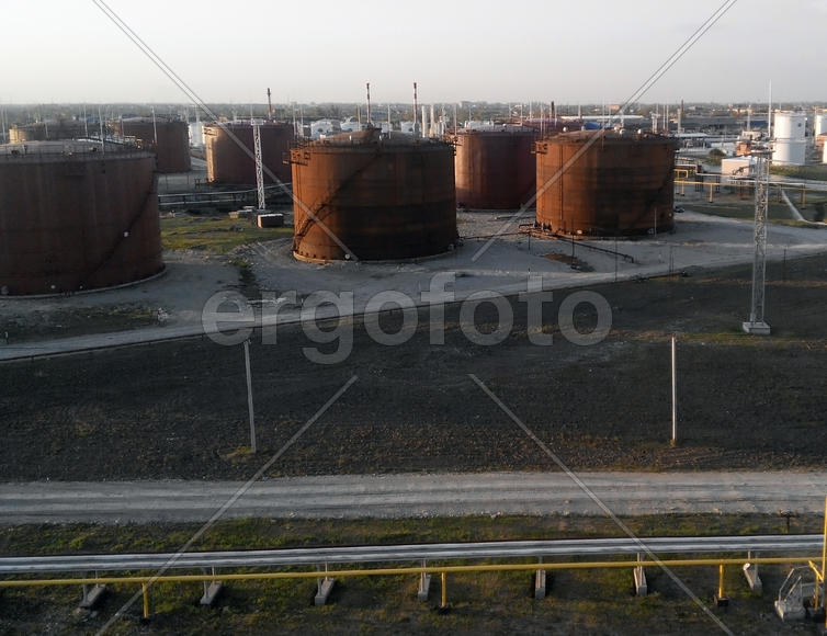 Tank the vertical steel. Oil refinery. Equipment for primary oil refining