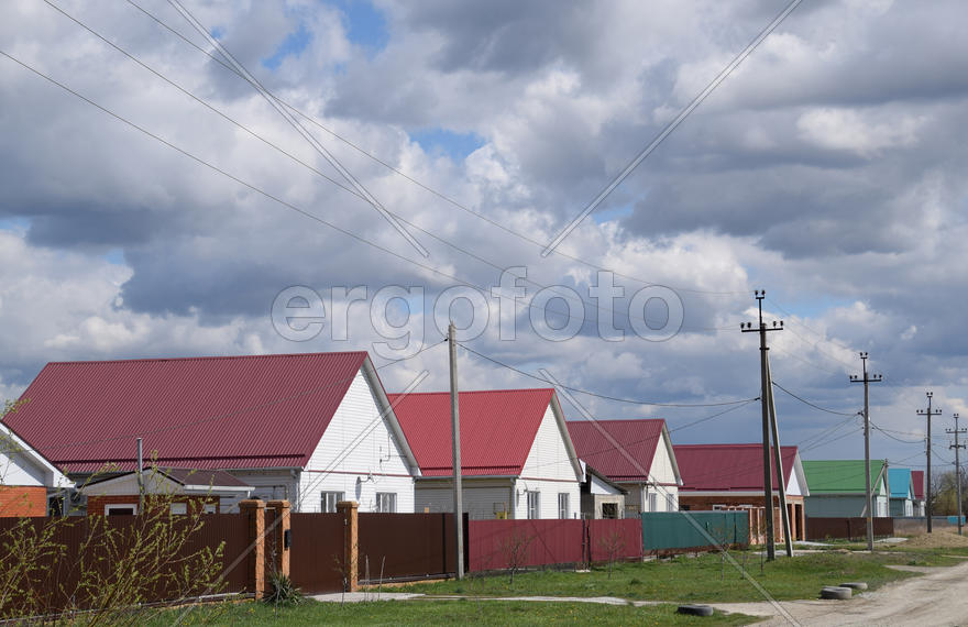 The roof of corrugated sheet on the houses. I
