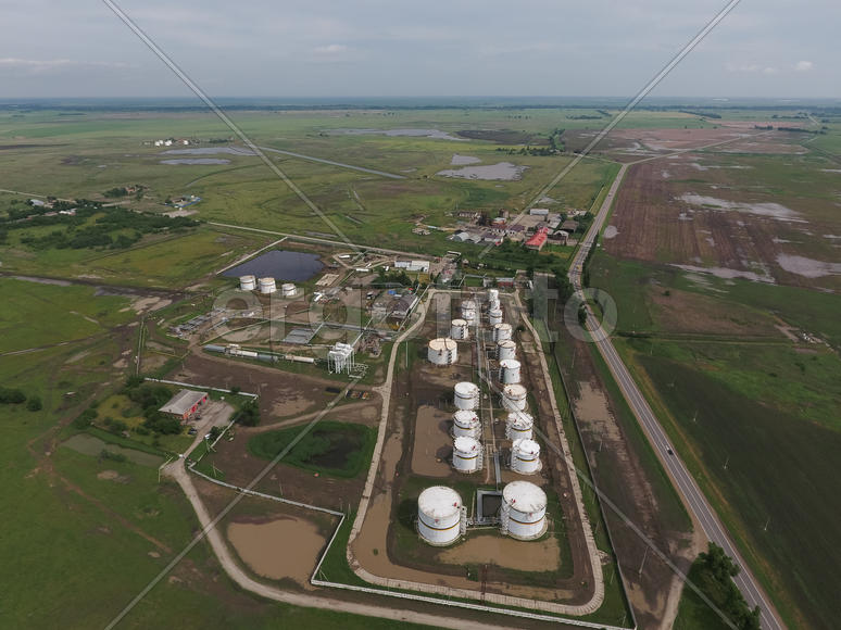 Aerial view of oil storage tanks. Industrial facility for the storage and separation of oil.