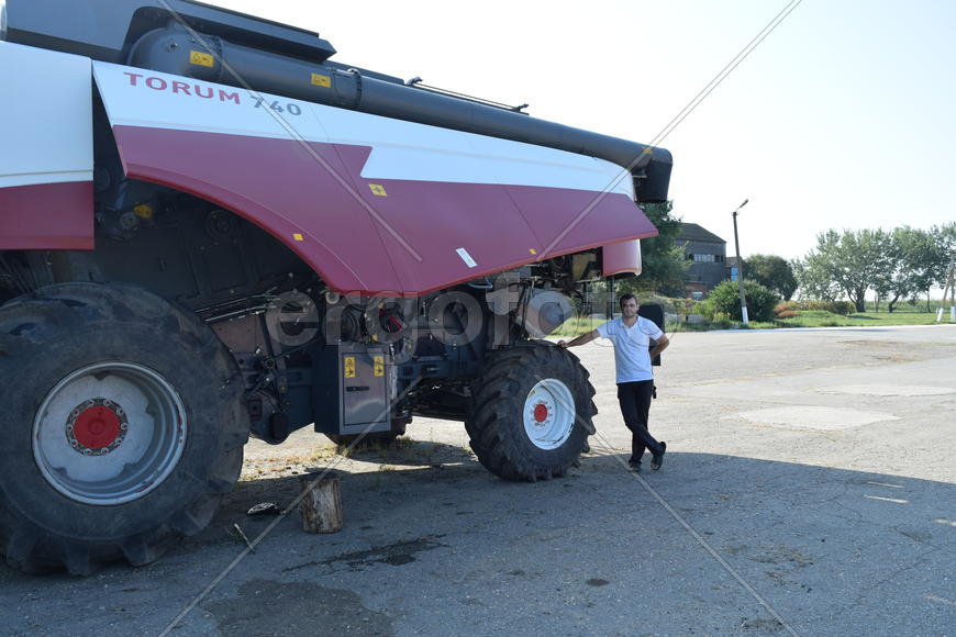Russia, Poltavskaya village - September 6, 2015: Combine harvesters Torum. Agricultural machinery.