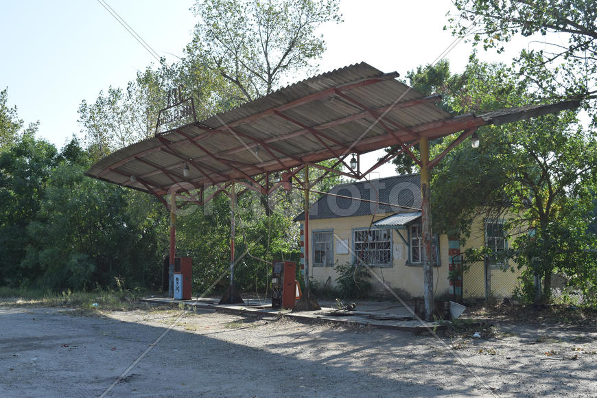 The old thrown gas station. Structure of times of socialism