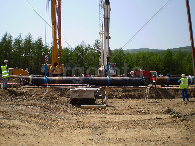 Sakhalin, Russia - 12 November 2014: Construction of the gas pipeline on the ground. Transportation