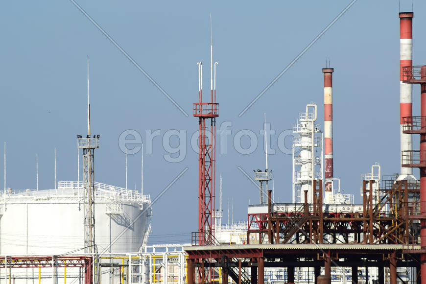 Distillation columns, pipes and other equipment furnaces refinery. The oil refinery. Equipment
