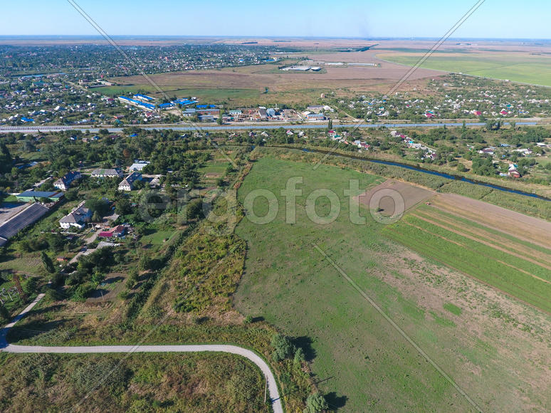 Top view of the small village. Aerophotographing above the village.