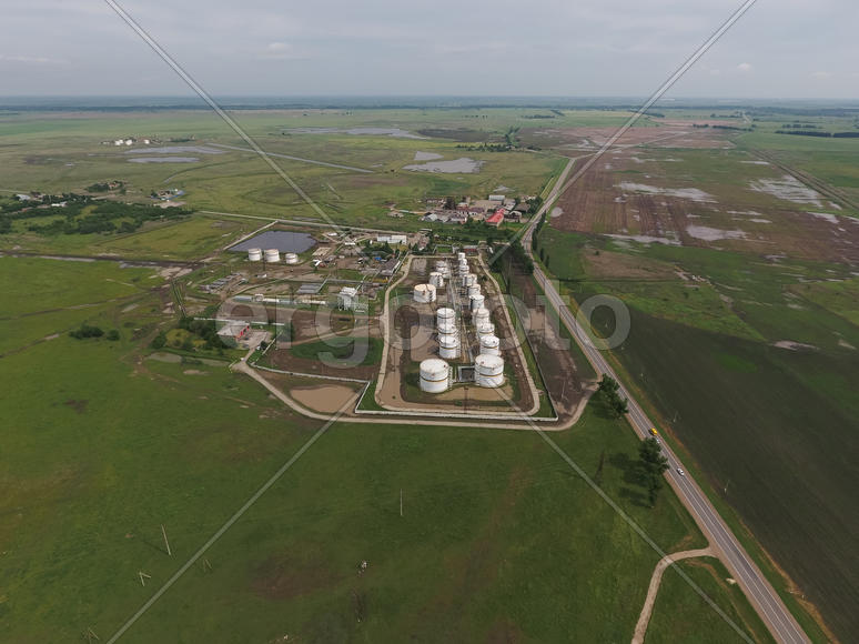 Aerial view of oil storage tanks. Industrial facility for the storage and separation of oil.