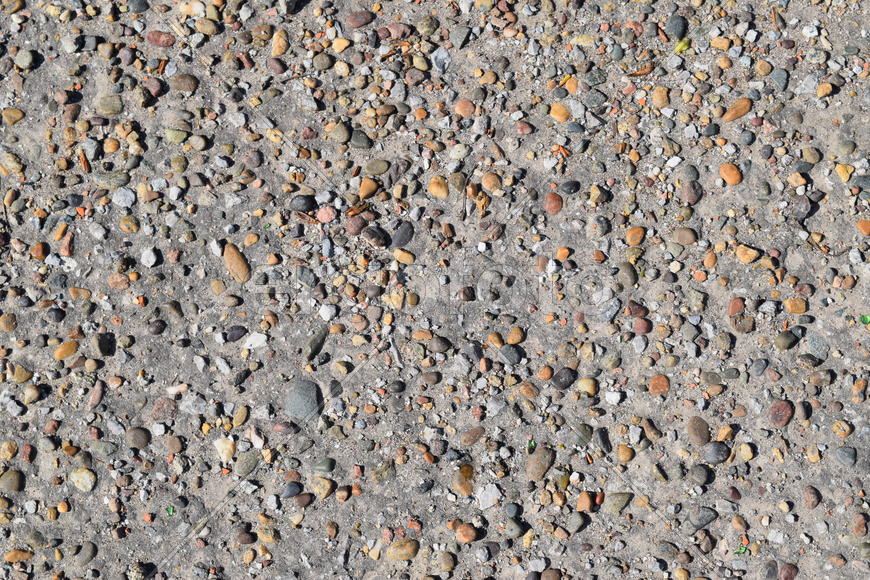 Pellet in old asphalt. Background texture of the old road