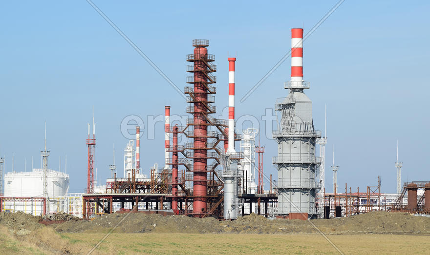 Distillation columns, pipes and other equipment furnaces refinery. The oil refinery. Equipment