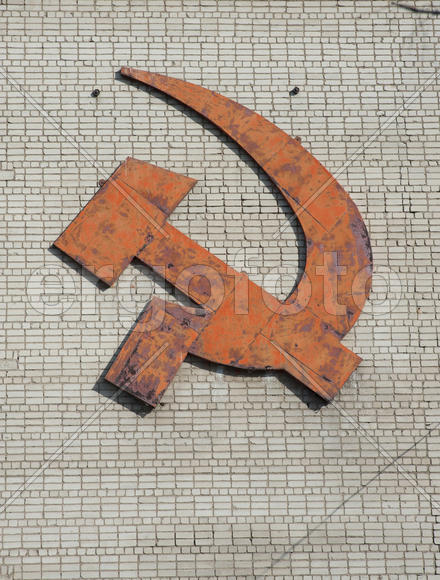 Hammer and sickle on the wall of an apartment house in city of Rostov