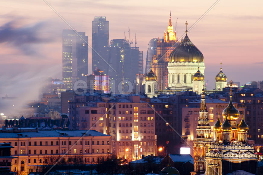 View of the Christ the Savior Cathedral and business center in the evening.