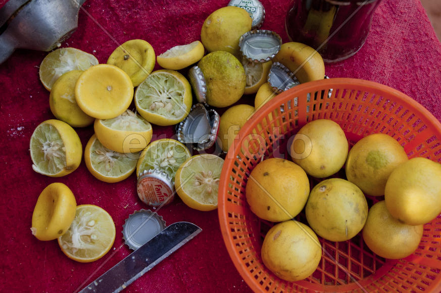 Whole and crushed lemons on the market in Goa