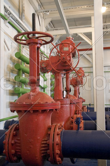 Red valves on the oil field