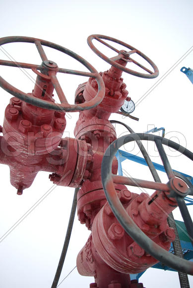 Red valves on the oil field
