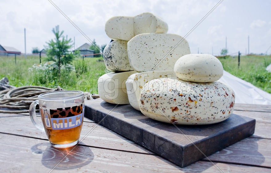 White cheese with a mug of tea