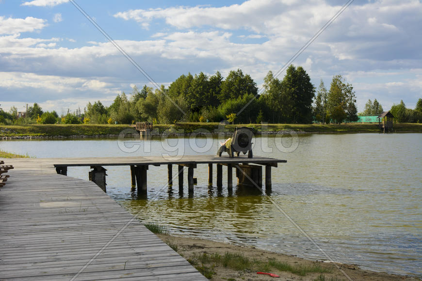 The bridge for recreation and fishing on a private lake.