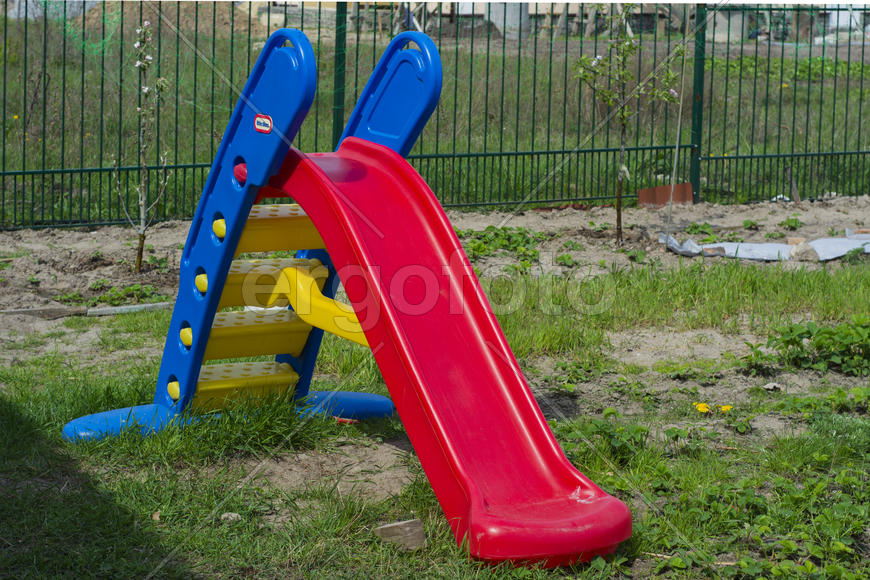 Children's slide in the yard of a private house.