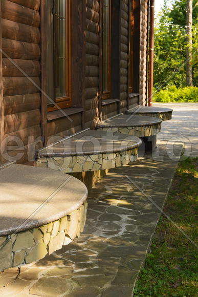 Wooden cabin in the pine forest in the summer