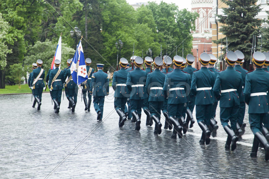 Soldiers on march in smart regimentals go for parade