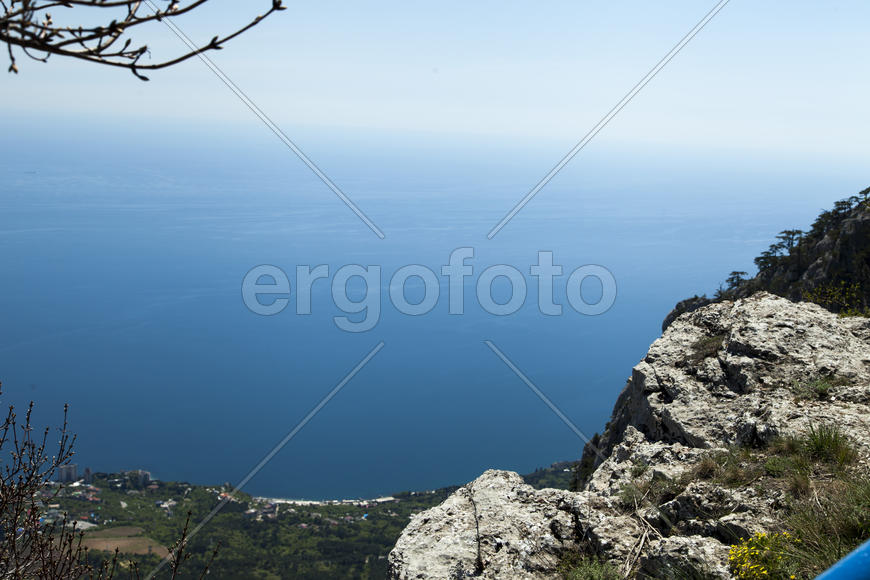 The seashore in the light of the sun from big height