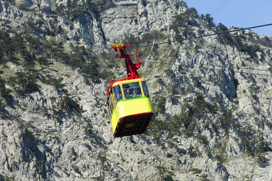Ropeway on the high mountain in the sunny day