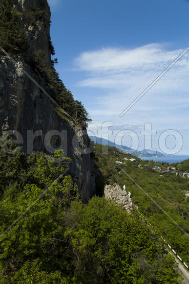 Mountains and the sea in beams of the bright southern sun