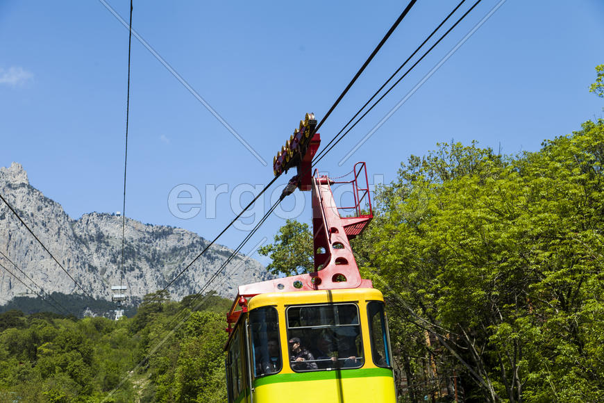 Ropeway on the high mountain in the sunny day