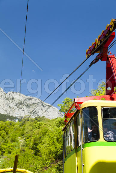 Ropeway on the high mountain in the sunny day