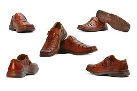 Мужские коричневые ботинки на белом фоне