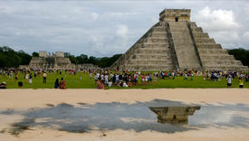 Pyramid in Chichen Itza with a water reflection