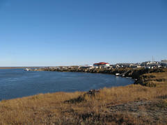 Coastal landscape of the tundra settlement. The settlement on Yamal