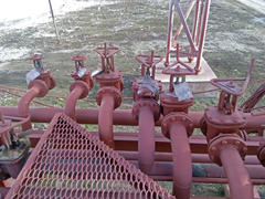Valves on the pipeline for pumping oil. Pipes at the refinery                             