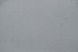 Gray paint on a wall. A background from paint