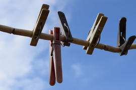 Clothespins on a wire. Accessories for drying clothes