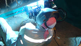 Welding of the pipeline. Process of creation of welding connection by the special mobile machine
