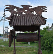 Wooden well for yard decorations. Wooden decorations
