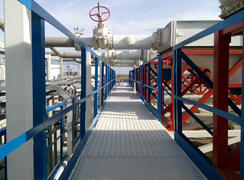 Steel service platform and stairs. Equipment refinery
