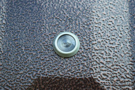 Supervisory peephole in the door. Means of the visual security of the home