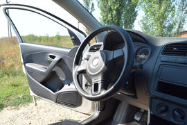 Salon of the car with an open door. Car interior