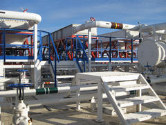 Steel service platform and stairs. Equipment refinery