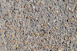 Pellet in old asphalt. Background texture of the old road