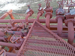Valves on the pipeline for pumping oil. Pipes at the refinery                            