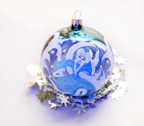 Christmas toy in the shape of a ball with a picture of Snow Maiden