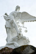 Sculpture of white angel criminal justice with his sword