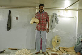 Baker bread in his shop the Pakistani city of Karachi