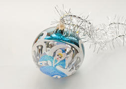 Christmas toy in the shape of a ball with a picture of Snow Maiden