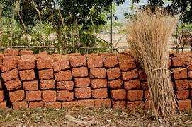 Brick built along the fence in the Indian village