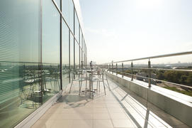 Sunny office terrace overlooking the city