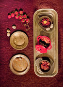 Three dishes on red tablecloth